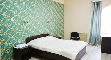 Фото Гостевой дом Atlas Hotel г. Томск 1