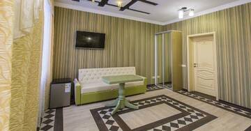 Фото номера Номер люкс с 1 двуспальной кроватью Гостиница Monomakh | Hotel г. Томск 5