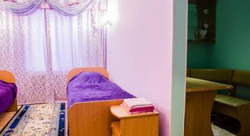 Фото номера Стандартный двухместный номер с 2 отдельными кроватями Гостевой дом Neptun г. Томск 2